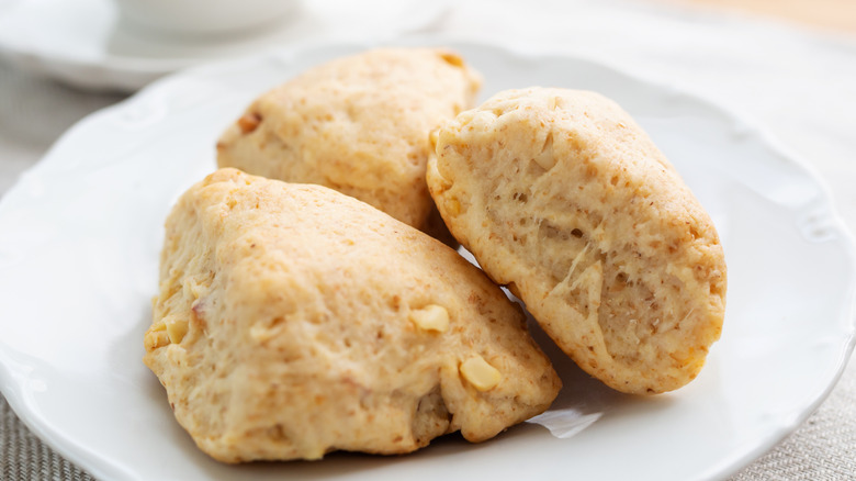 Scones on a plate with tea