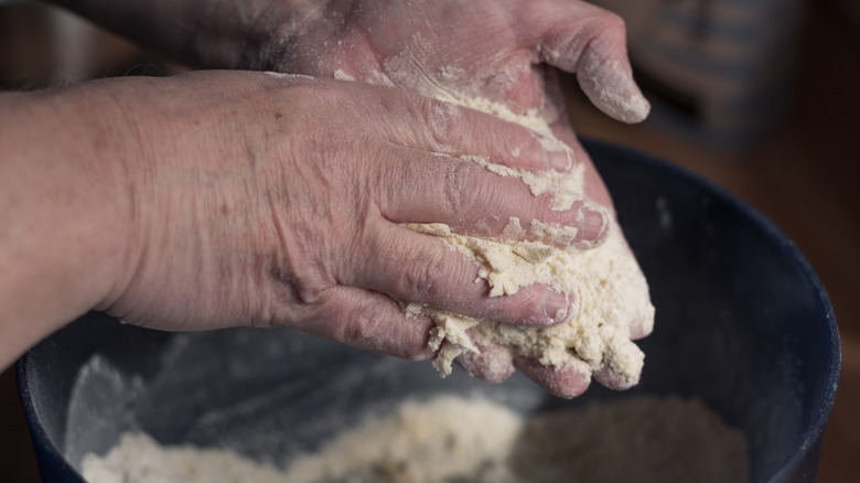 Rubbing together flour and butter