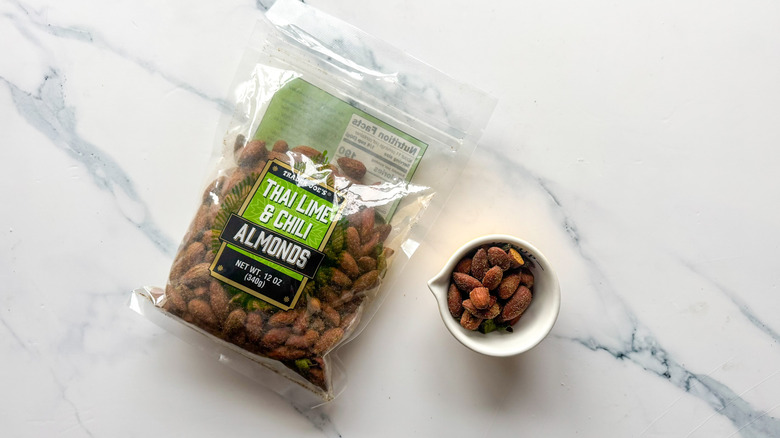 Thai lime and chili almonds on marble surface