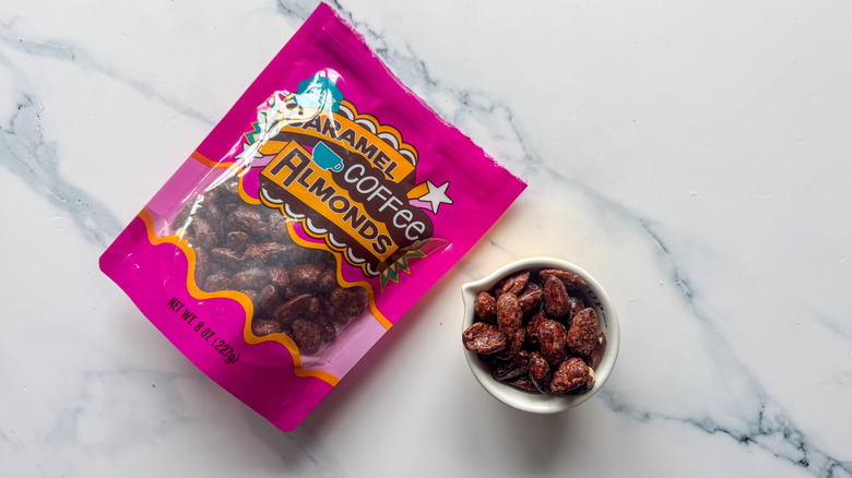 Caramel coffee almonds on marble surface