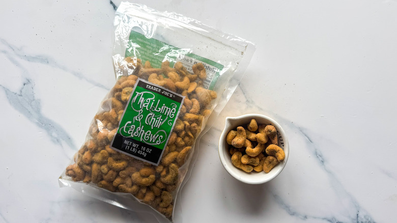 Thai lime and chile cashews on marble surface