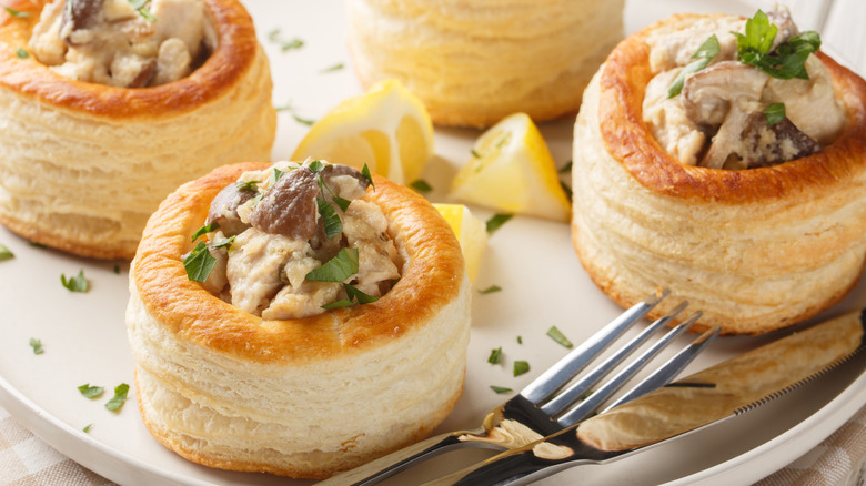 Vol au vents with chicken and mushrooms on a plate