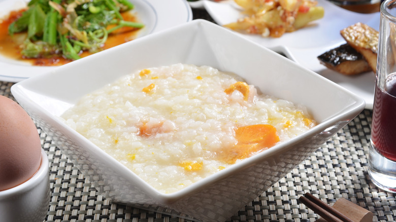 sweet potato congee next to traditional sides