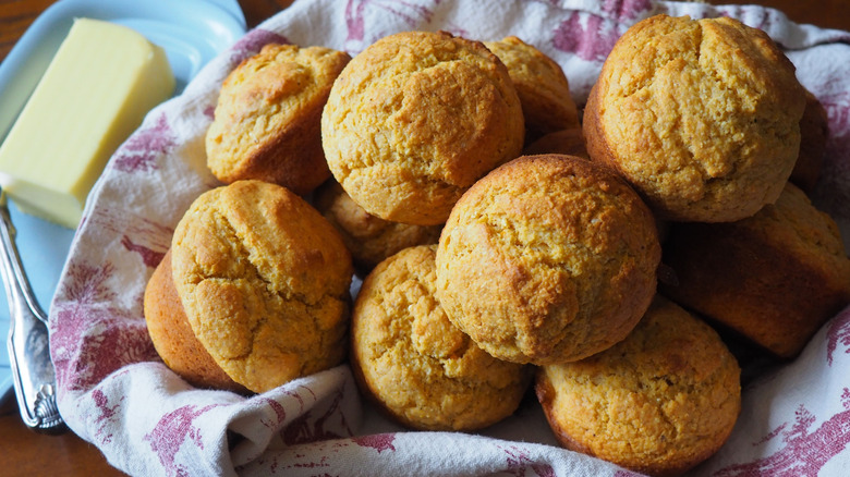 sweet potato corn muffins sit in a basket