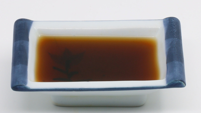 ponzu sauce in small rectangular dish