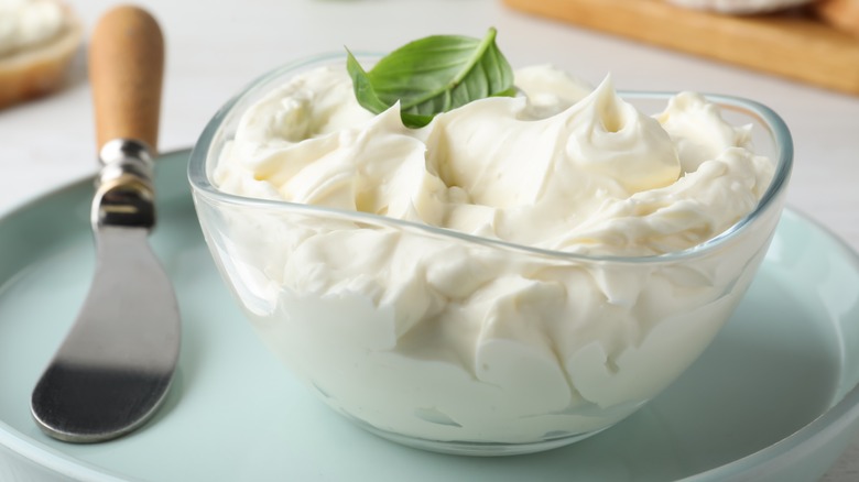 Bowl of cream cheese with garnish