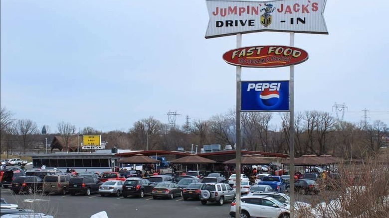 Exterior of Jumpin' Jack's Drive-In with a full parking lot