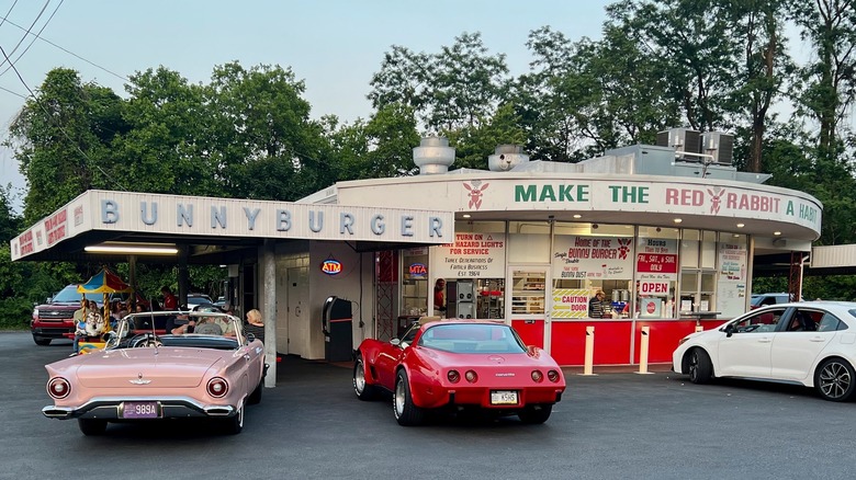 Red Rabbit Drive-In with two classic cars in the front