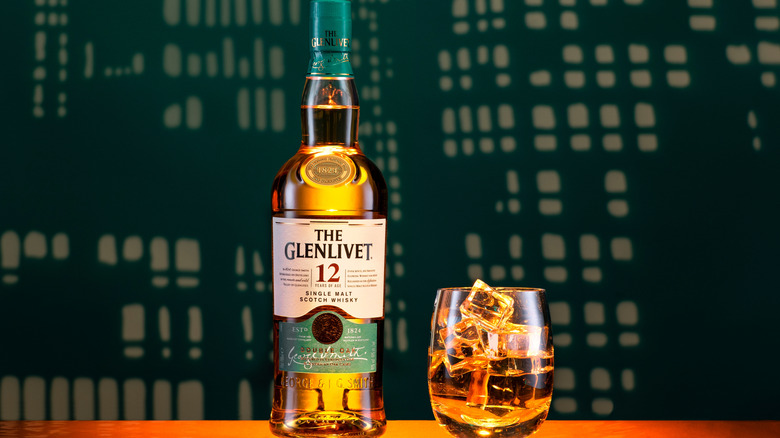 A glass and bottle of The Glenlivet 12 Year
