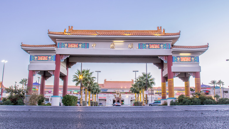 The ornate gateway to Vegas' Chinatown is shown from the road