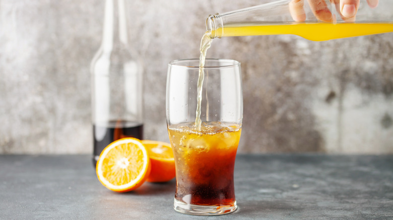 Mixing a spezi-meister with cola and citrus soda