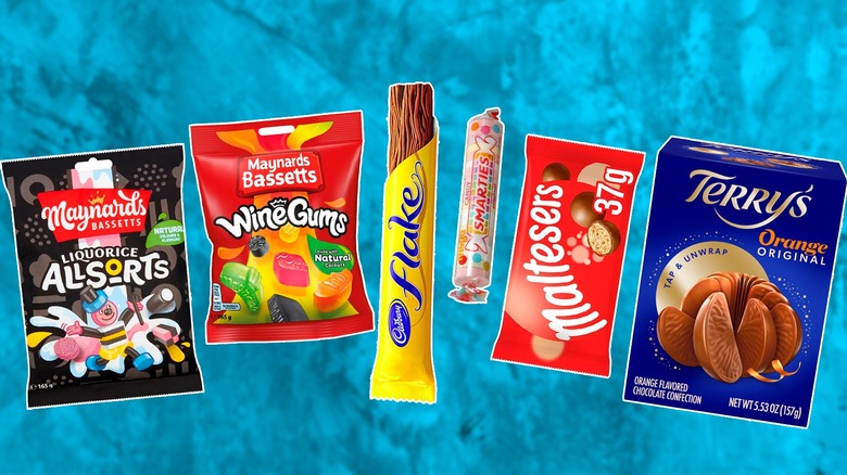 Variety of popular British candy on blue background