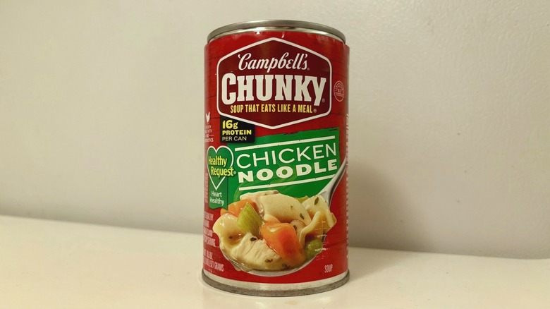 A can of Campbell's Chunky Chicken Noodle Soup