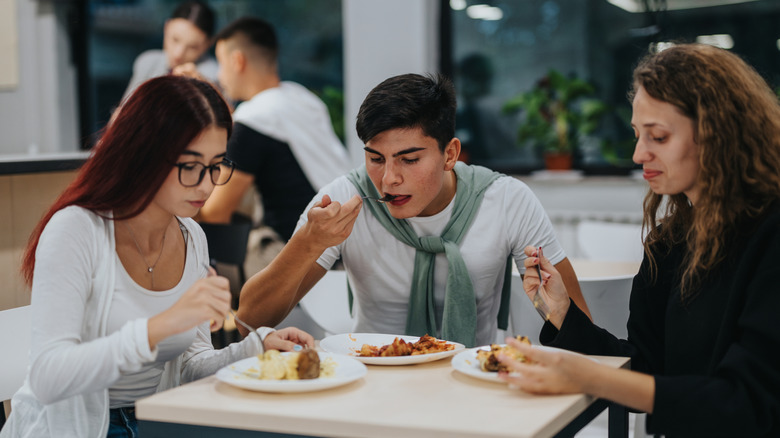 Students eating in a cafeteria
