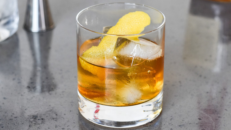 Sweet lavender Old Fashioned on granite countertop