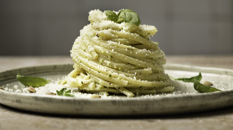 Plate of pasta with herbs and cheese