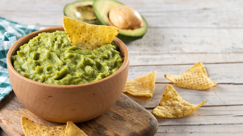 Bowl of guacamole with tortilla chips
