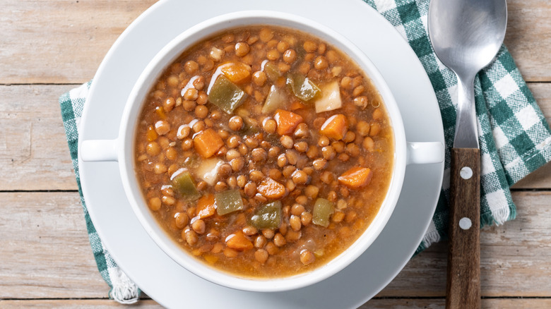 Bowl of lentil soup with spoon