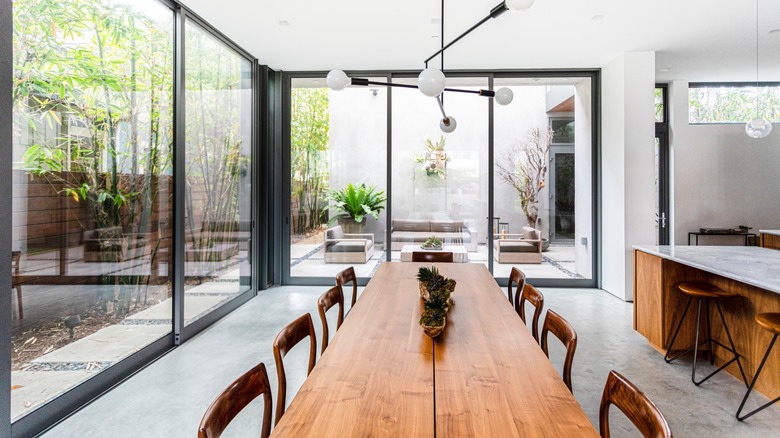 Mid-century modern dining room with windows