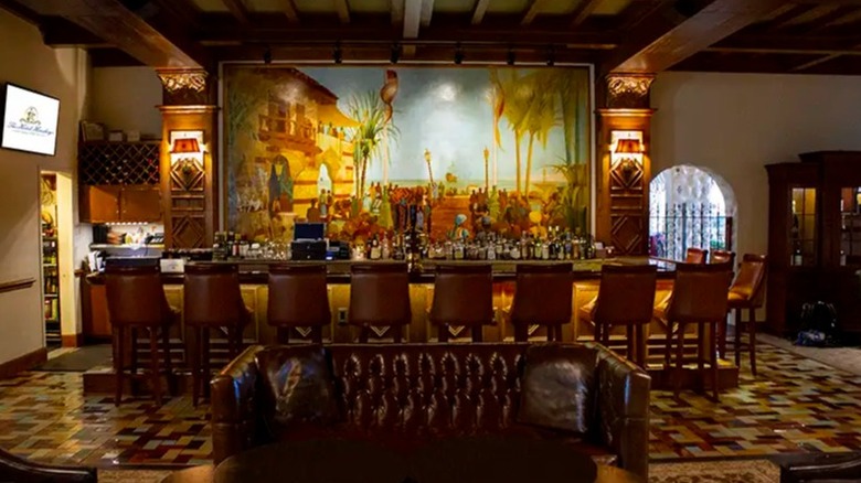 Interior of Iberian Lounge, including the bar and mural