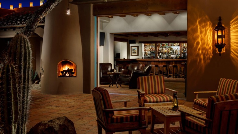 Patio and view inside LON's Last Drop, including the iconic adobe fireplace