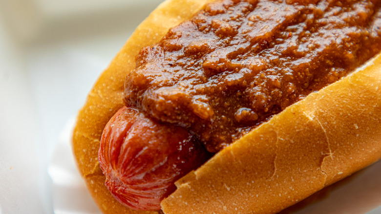 Hotdog topped with meat "slime" sauce