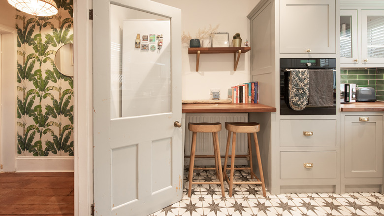 Kitchen with row of books on counter