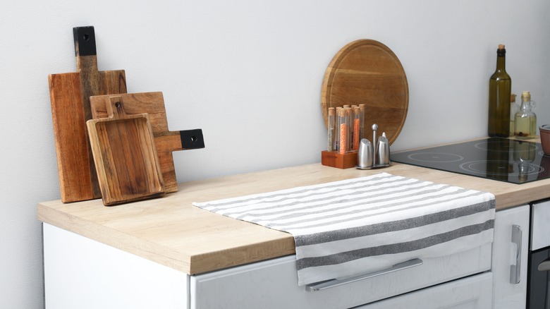 Kitchen counter with several cutting boards