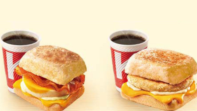 Breakfast paninis from KFC China next to a couple cups of coffee
