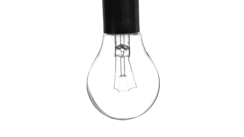 clear glass bulb suspended on black wire