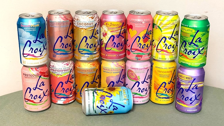 fifteen cans of La Croix arranged on a table