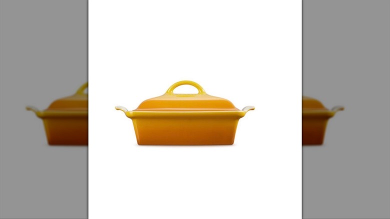 A mustard-colored casserole dish