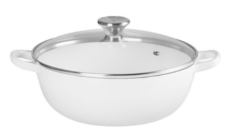 A white soup pot with handles on both sides and a tempered glass lid against a white background
