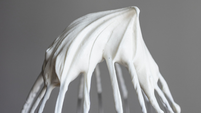 whipped cream on top of whisk