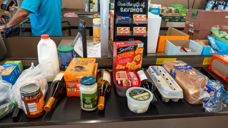 Aldi register with products