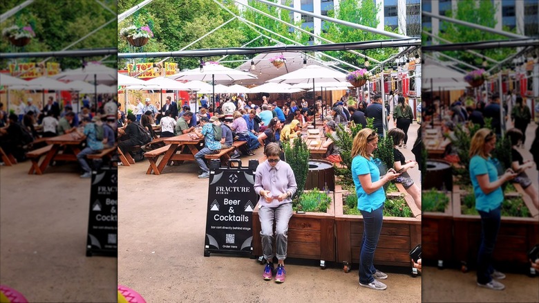 A crowded outdoor beer garden in Midtown Beer Garden in Portland