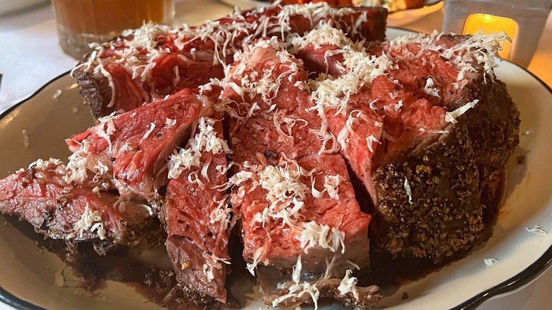 A plate of prime rib with grated horseradish at Bon Ton Prime Rib