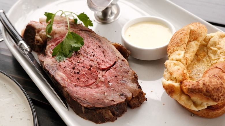 A slice of prime rib with horseradish cream and a Yorkshire pudding at Gretel