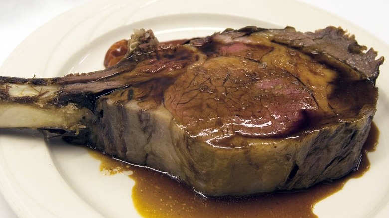 A bone-in prime rib on a plate at Keen's Steakhouse