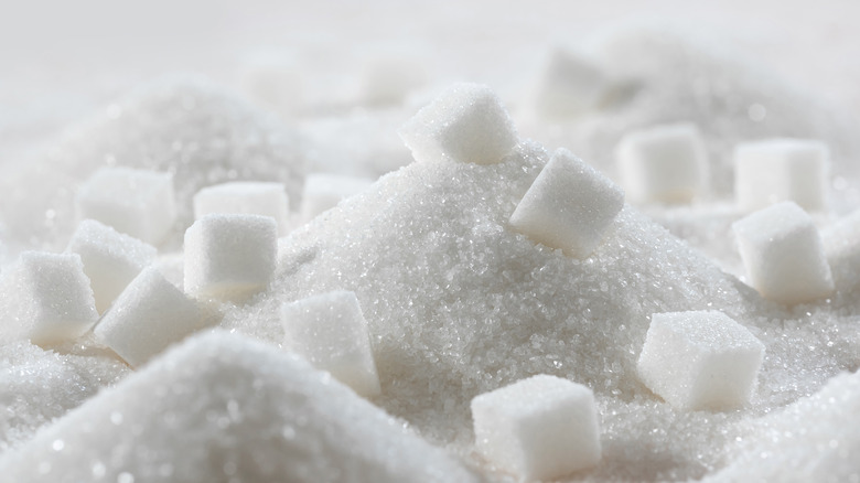 white sugar and sugar cubes