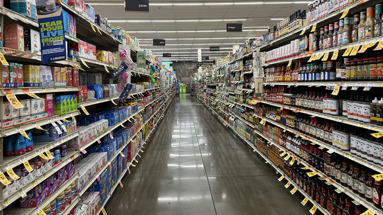 A narrow grocery store aisle