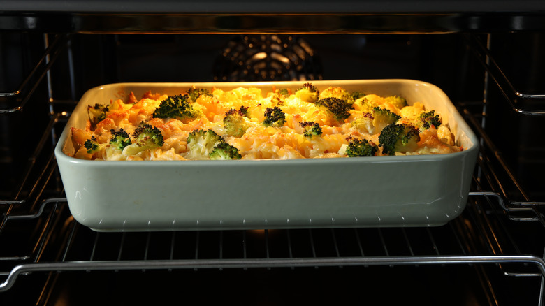 A casserole on an oven rack in the oven