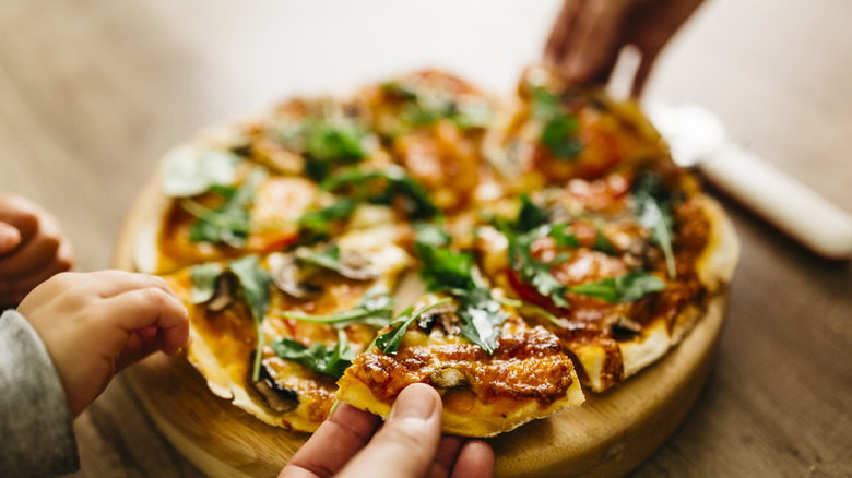 Homemade pizza with basil