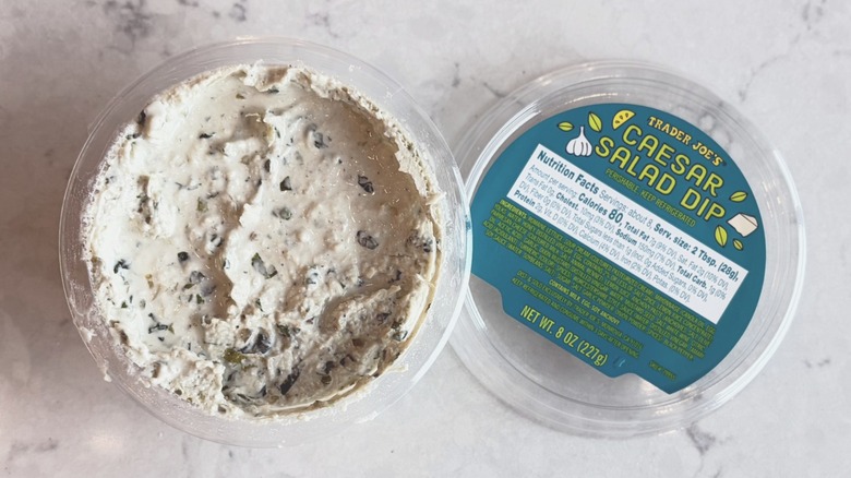 An open container of Trader Joe's Caesar Salad Dip