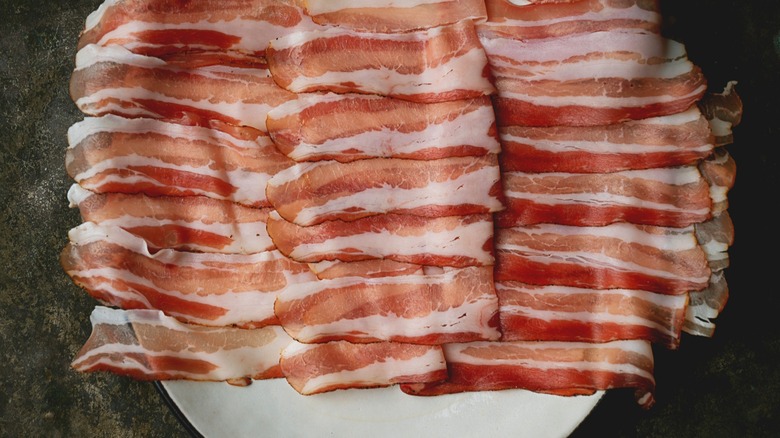 streaky bacon on a white plates