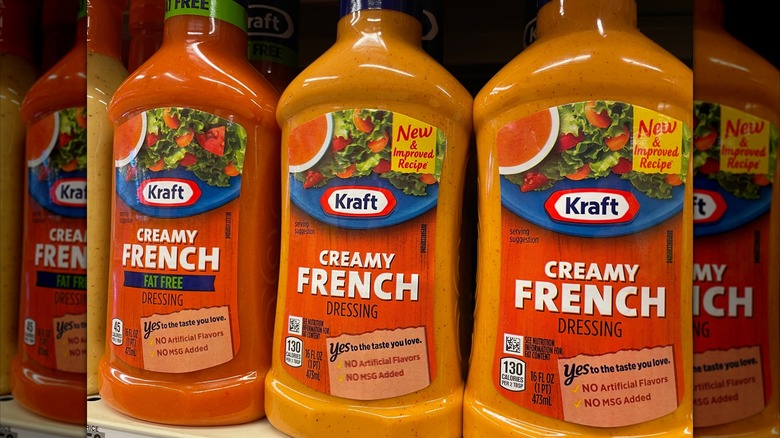 French dressing in a white ramekin on a white background