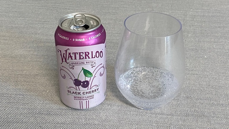 Black Cherry Waterloo flavor in a can next to a glass