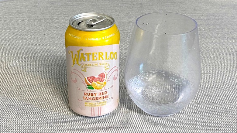 Ruby Red Tangerine Waterloo flavor in a can next to a glass