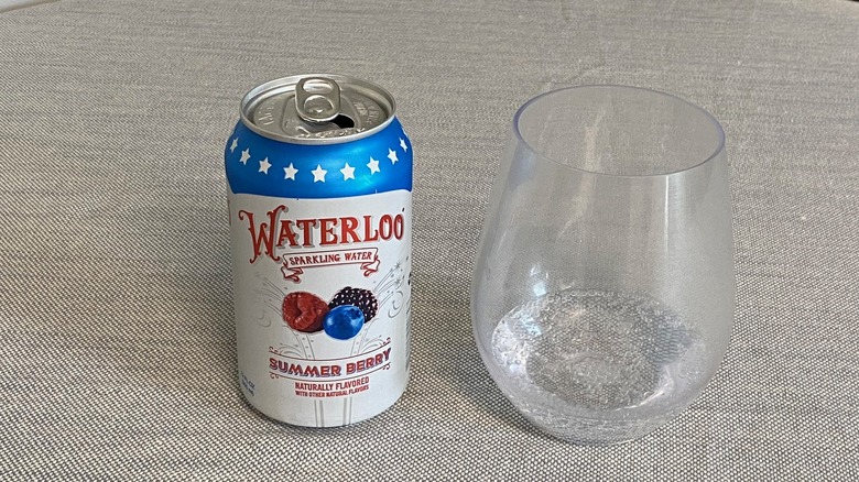 Summer Berry Waterloo flavor in a can next to a glass