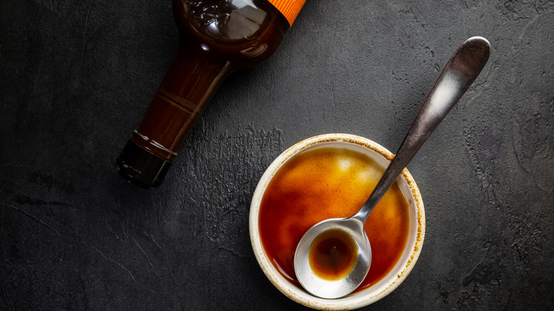 Worcestershire sauce in a bowl with a spoon